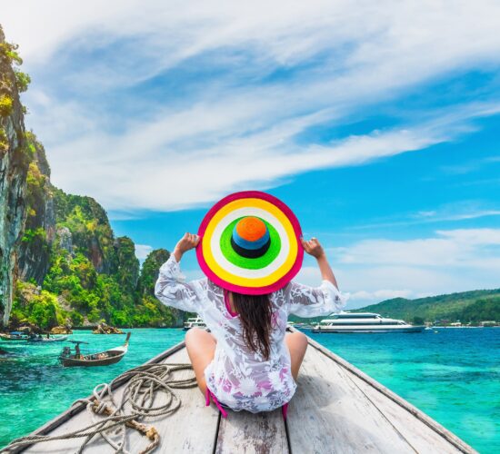 Lifestyle traveler woman in beach wear joy fun on boat Phi Phi island Krabi, Attraction landmark tourist travel Phuket Thailand summer holiday vacation trips, Tourism beautiful destinations place Asia