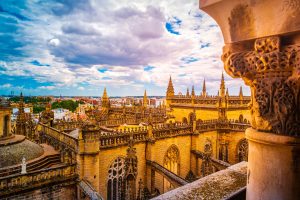 Aerial view of Seville city and Cathedral of Saint Mary of the See in Seville, Andalusia, Spain, Europe